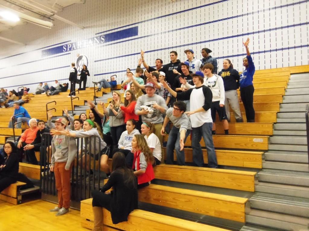 The+student+section+cheers+to+get+a+t+shirt+from+the+cheerleaders.%0D%0A