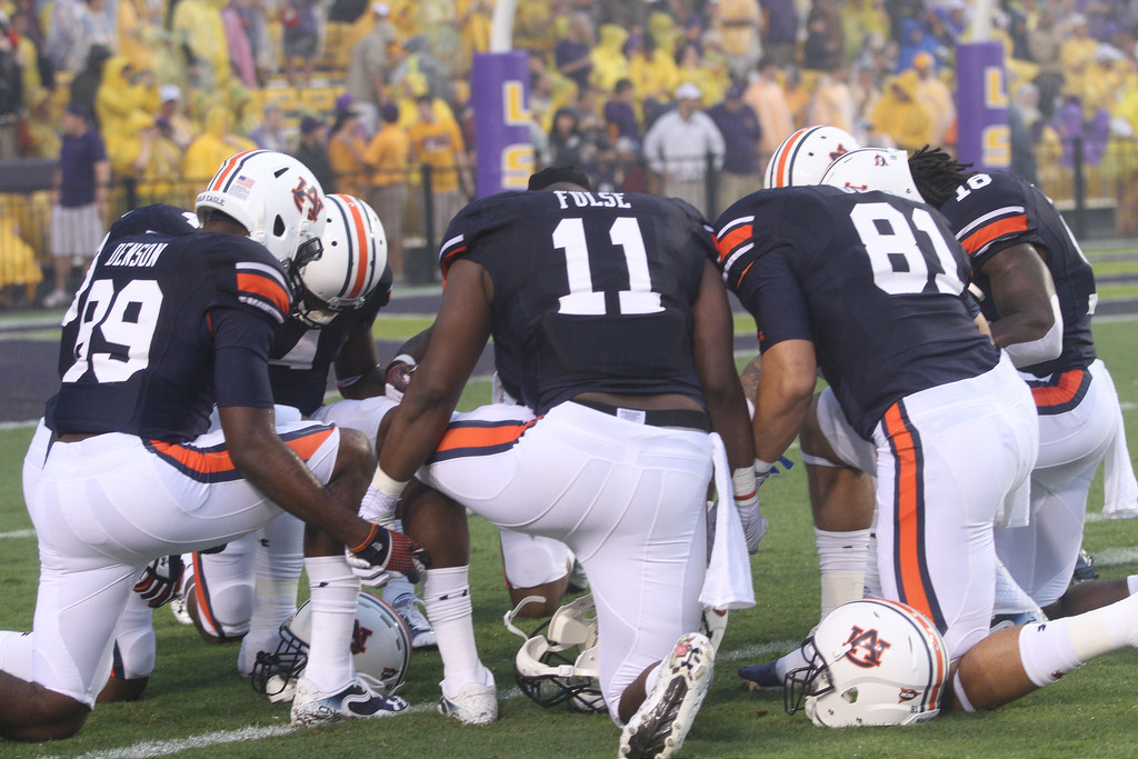 The #TakeAKnee movement has become a controversial protest by football players seeking to raise awareness of social injustice.