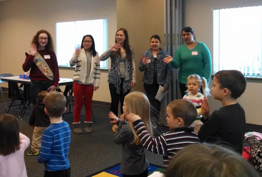 Girl Scout troop 6467 from Southern Lehigh High School teach a group of young children during a program about Doctor Seuss. 