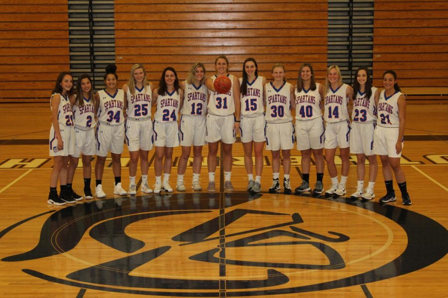 This years JV/Varsity team poses for a photo: (left to right) Riley MacIntosh, Holly Walter, Kaya Mobley, Steph Schmitt, Jeanne Rautureau, Kiera Wilkins, Ellie Cassel, Olivia Snyder, Alyssa Rice, Lauren Conron, Taylor Moncman, Caroline Bennett, Delaney Lewis.  