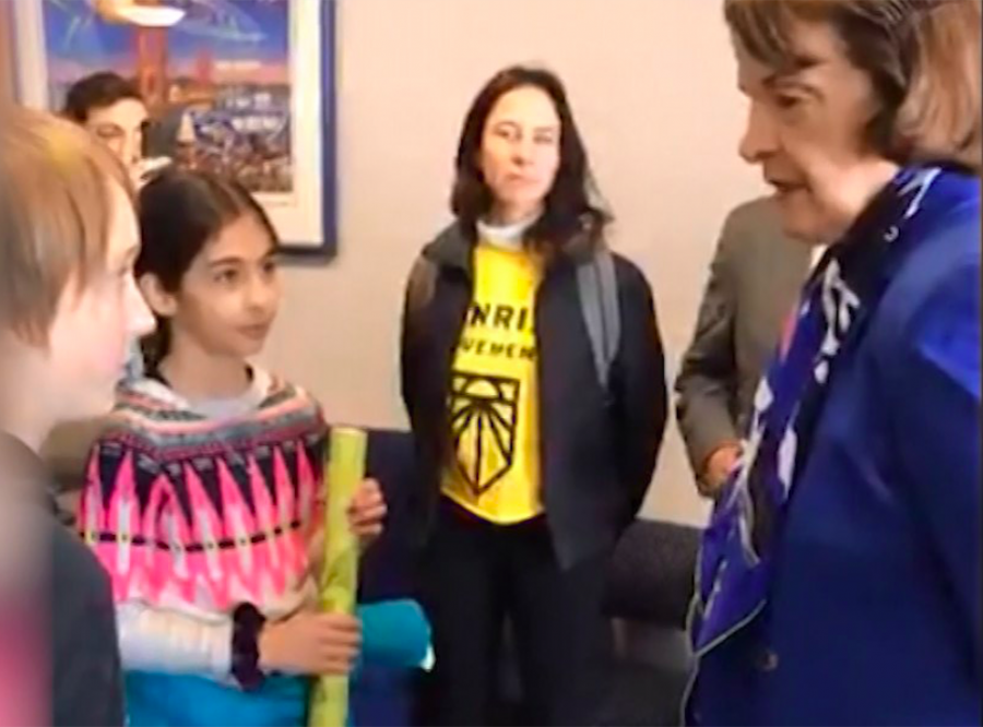 Senator Feinstein addresses the youth supporting the Green New Deal. 