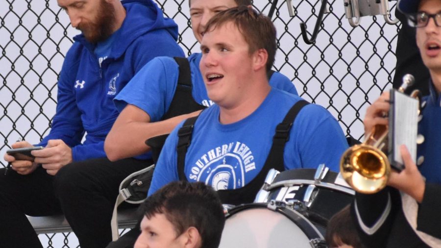AJ is a talented percussionist in the marching band and enjoys performing the field show as part of the team of snare drummers, as well as cheering on the football team from the stands.