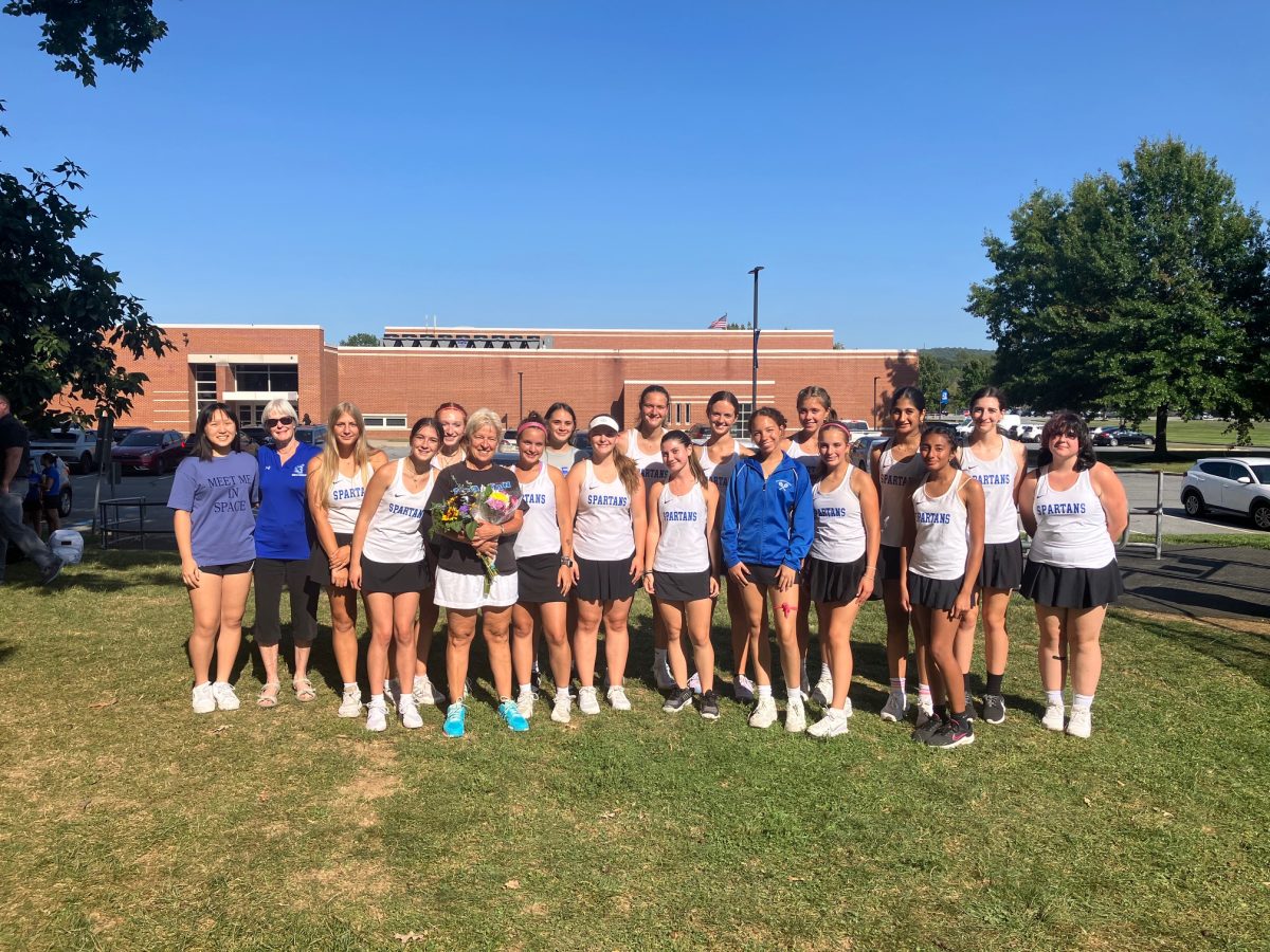 The Southern Lehigh Girls Tennis Team celebrates Coach Andraea Drabenstott's retirement.