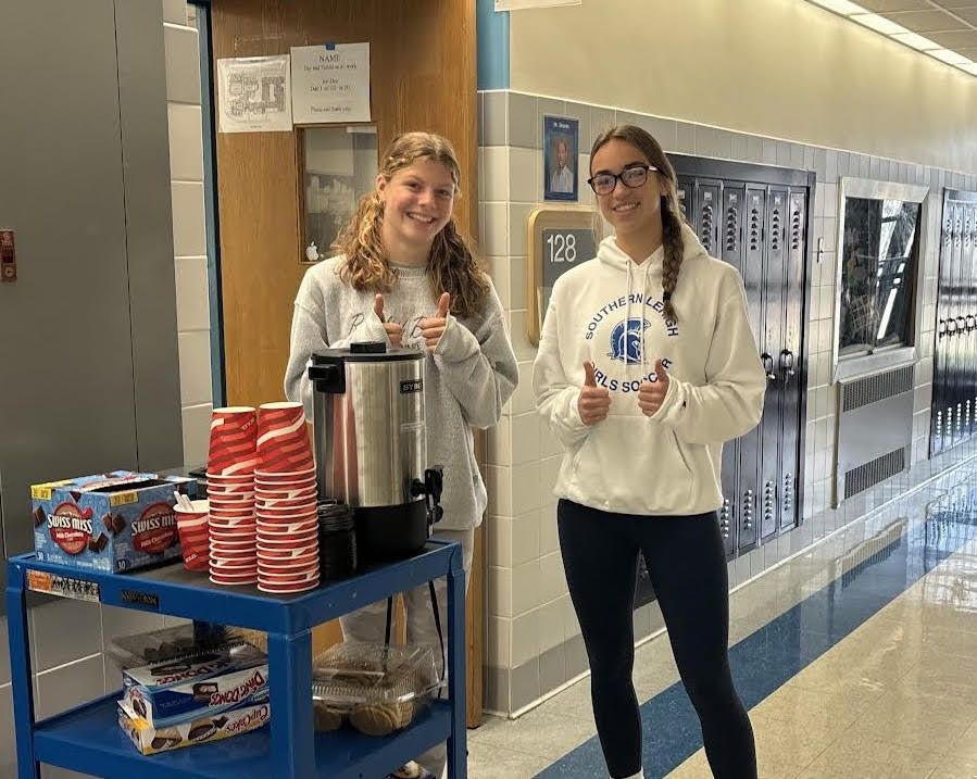 Farrah Smith(left) and Abby Bealer(right) helping run the snack cart during Spartan period.